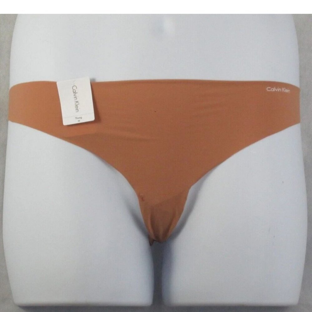 Calvin Klein Women's Invisibles Thong Panty Underwear, Light Brown, Medium